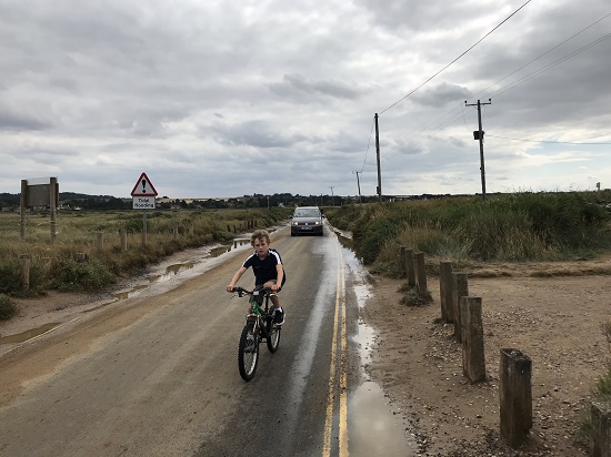 Bike and car at low tide