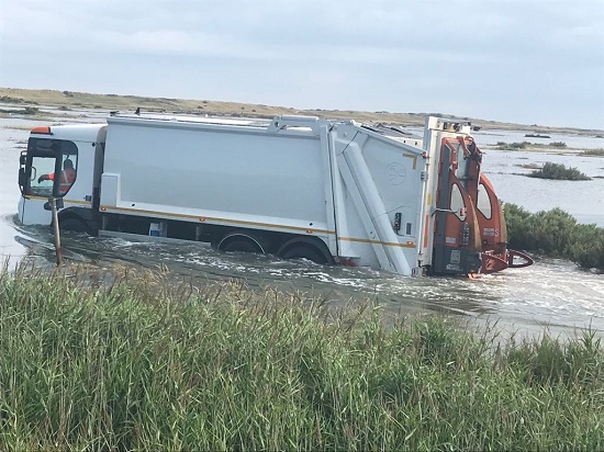 Dustcart caught at high tide